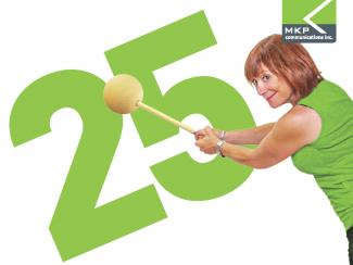 CEO Hillary Kelbick with large mallet hitting the number 25