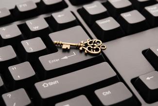 Ornate key on top of the enter key of a keyboard